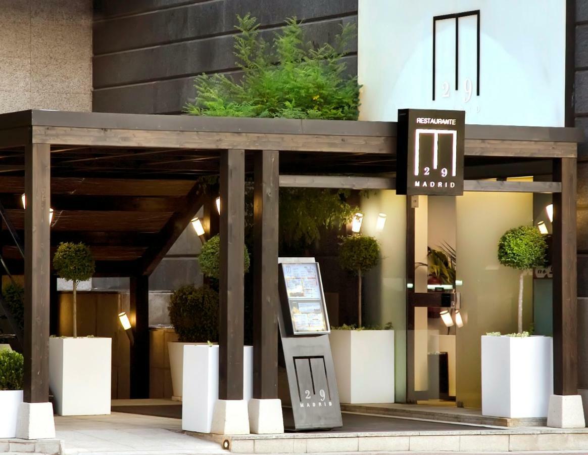 Hotel Miguel Angel マドリード エクステリア 写真 Entrance of the hotel