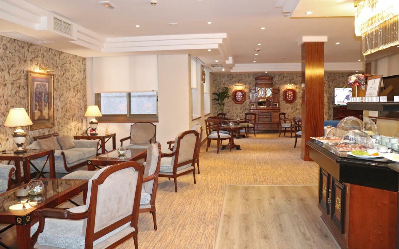 Hotel Miguel Angel マドリード エクステリア 写真 The lounge at the airport