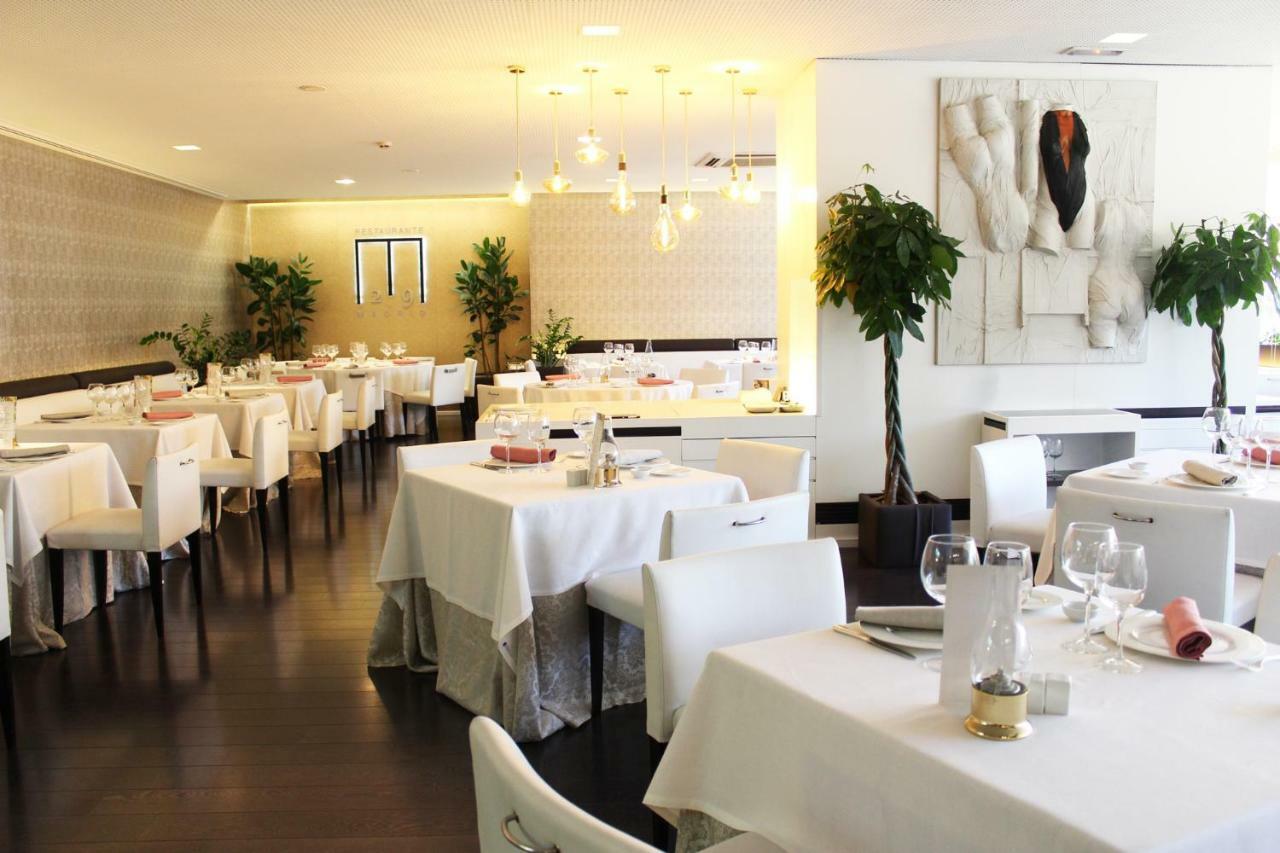 Hotel Miguel Angel マドリード エクステリア 写真 Interior of the restaurant